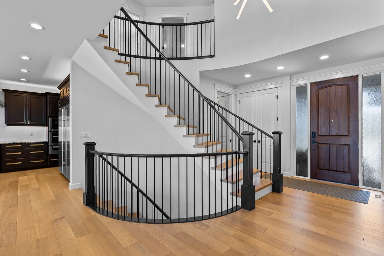 Clean stairway in an Auburn Bay home prepared for Calgary MLS listing photos