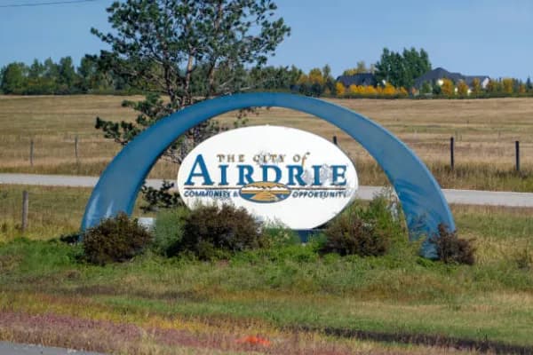 Real estate photography service area card for Airdrie homes near Calgary