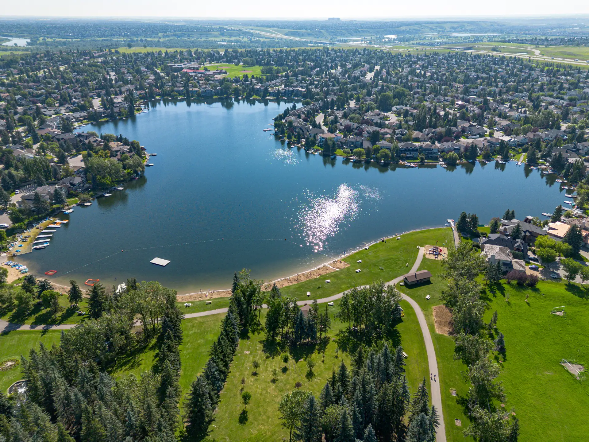 Drone photo of a Calgary home near Sundance Lake by Photos 4 Real Estate