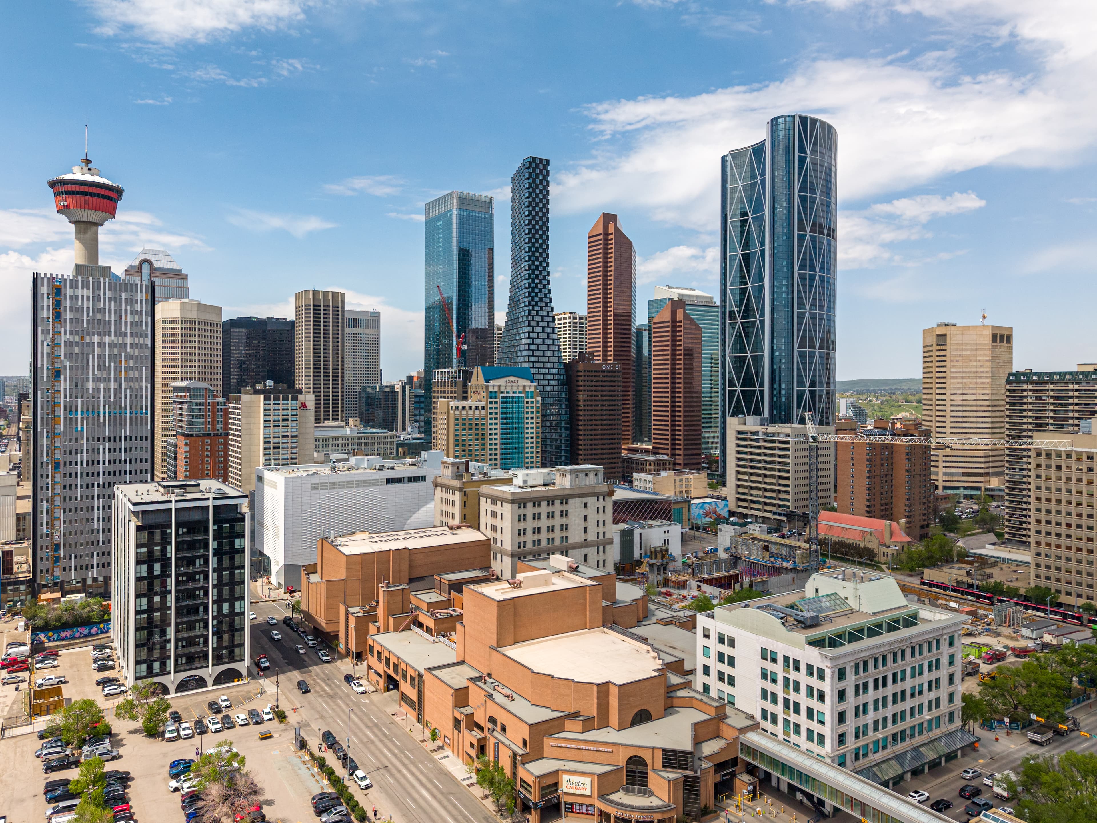 Aerial drone photo of East Village Calgary with Calgary Tower and downtown skyline from above