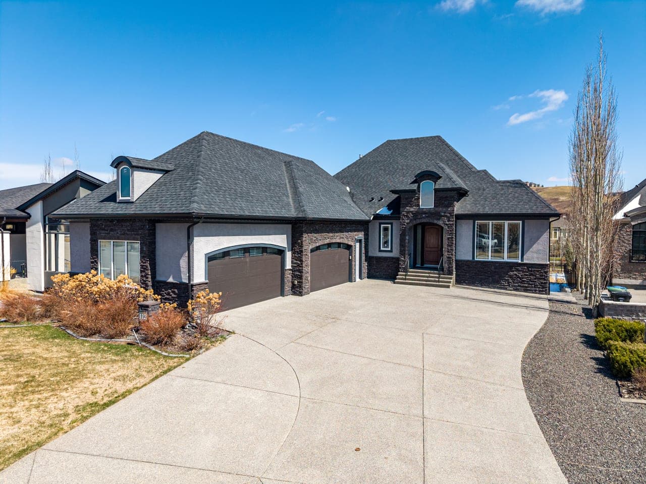 Angled drone view of a house in Cranbrook View SE Calgary