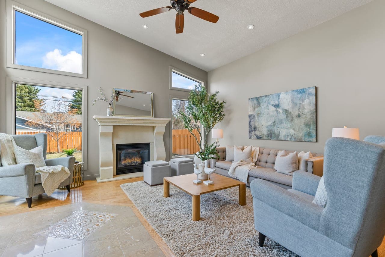 Fireplace in a Banff sunroom photographed for premium mountain real estate marketing