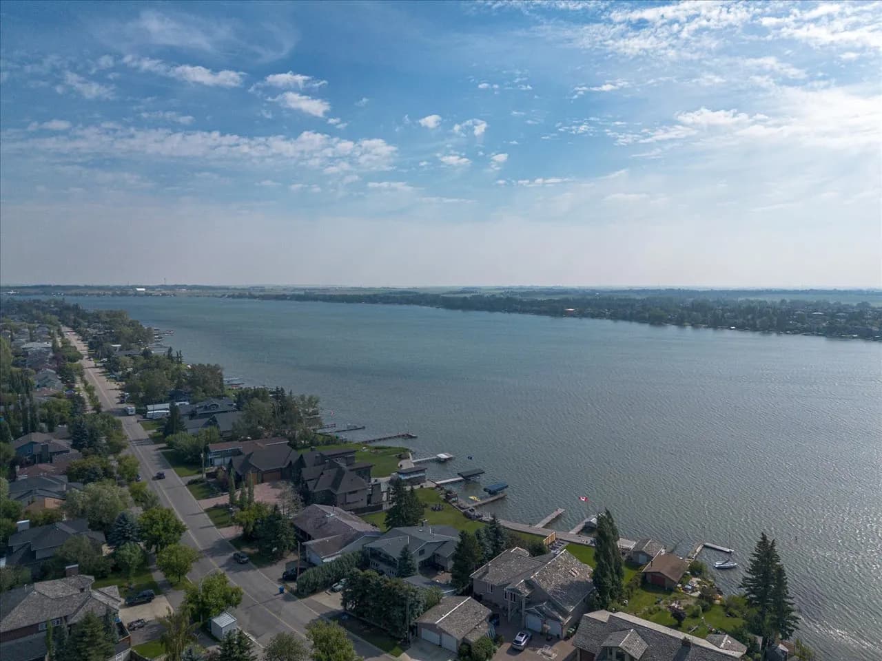 Drone view of Chestermere Lake and surrounding homes for real estate marketing
