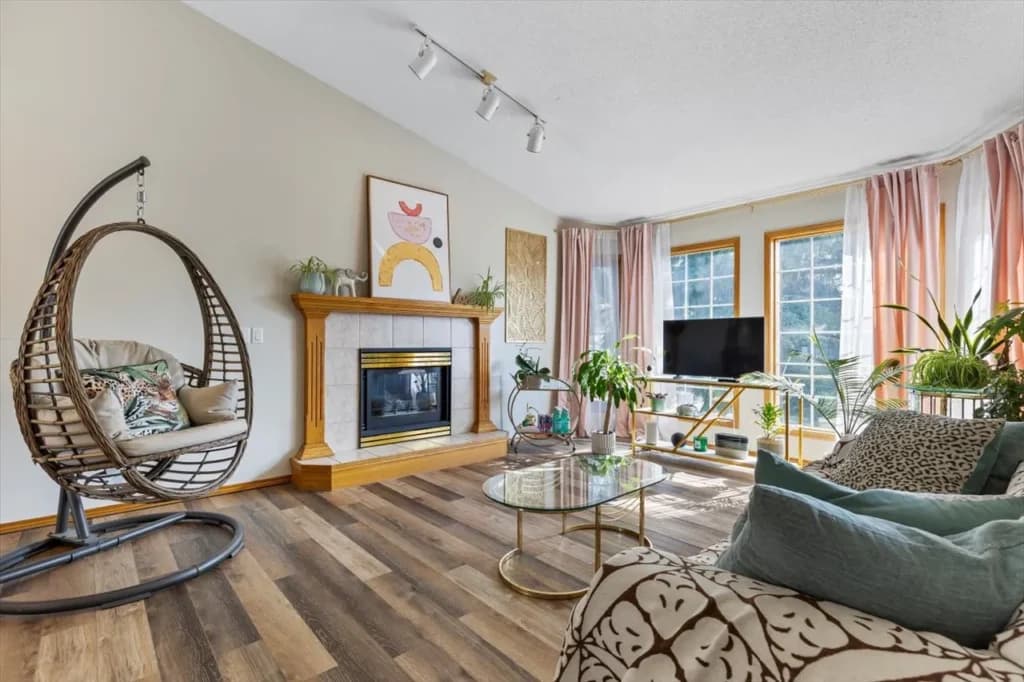 Bright living room real estate photo of a Chestermere home prepared for an MLS listing