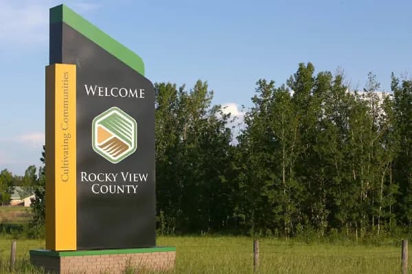 Exterior real estate photo of a Rocky View County acreage property by Photos 4 Real Estate