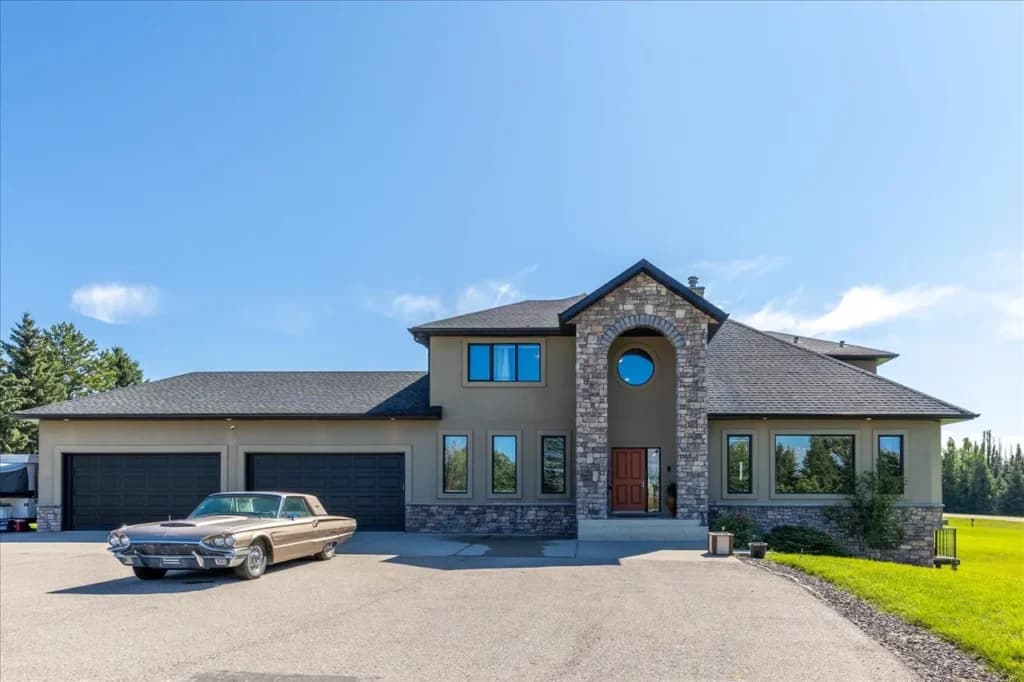 Bright interior real estate photo of a Springbank luxury home prepared for an MLS listing