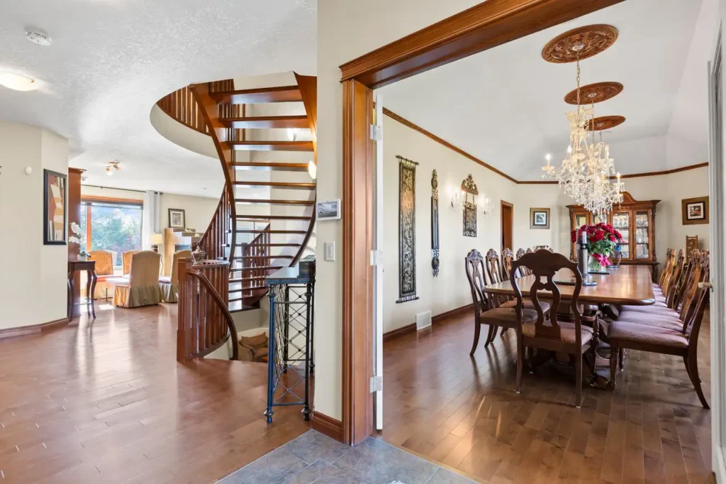 Big dining area with stairs to the second floor - professional real estate photography